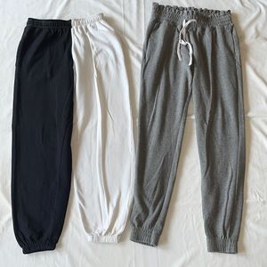 Two XS hollister sweatpants. One grey and one two toned white and black